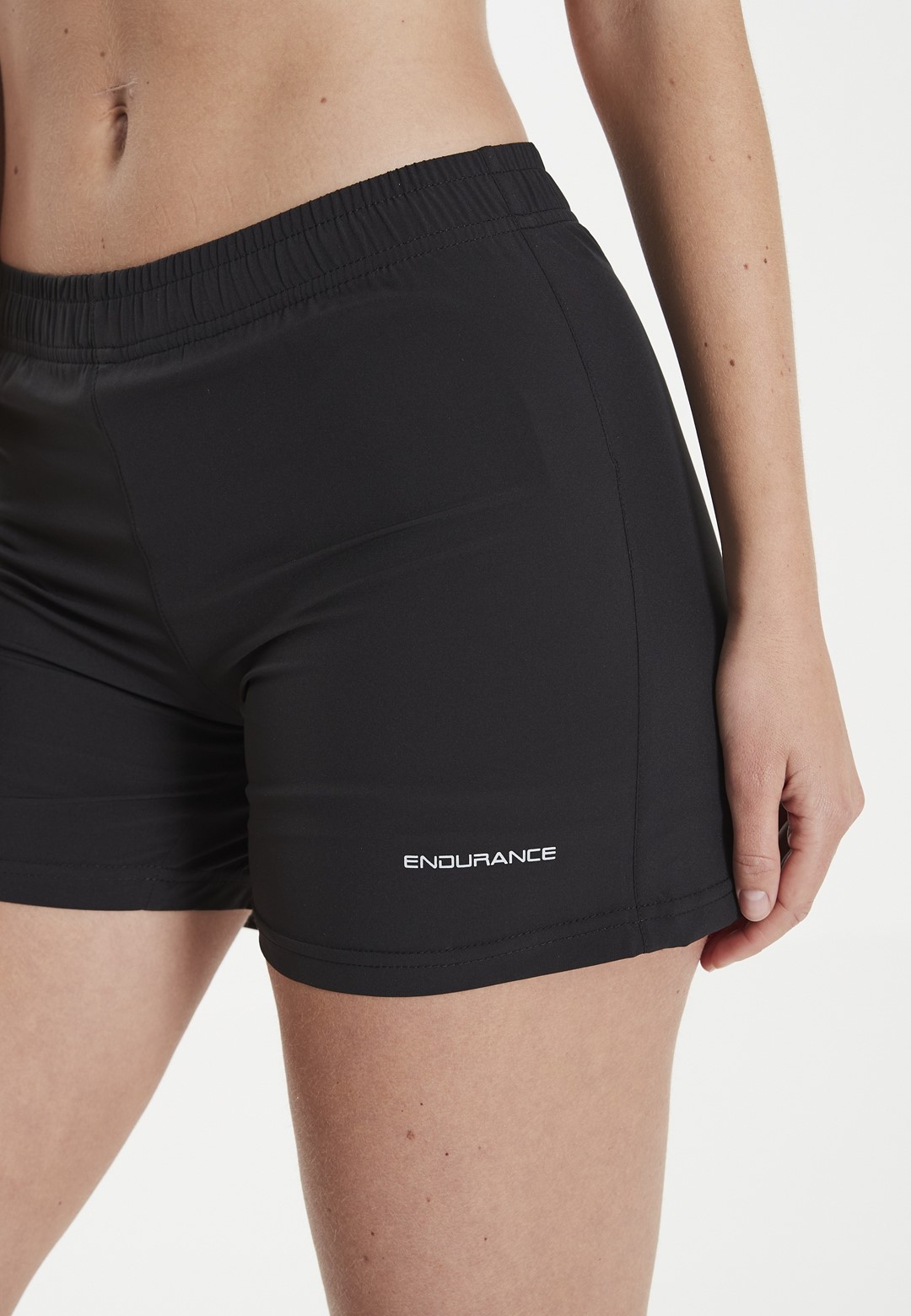 E151425/1001 ENDURANCE POTENZA 2w1 W SHORTS - Damskie Spodenki